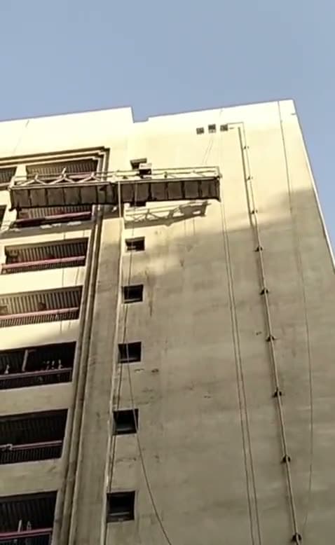 Suspended Platform Descent — Residential Tower
